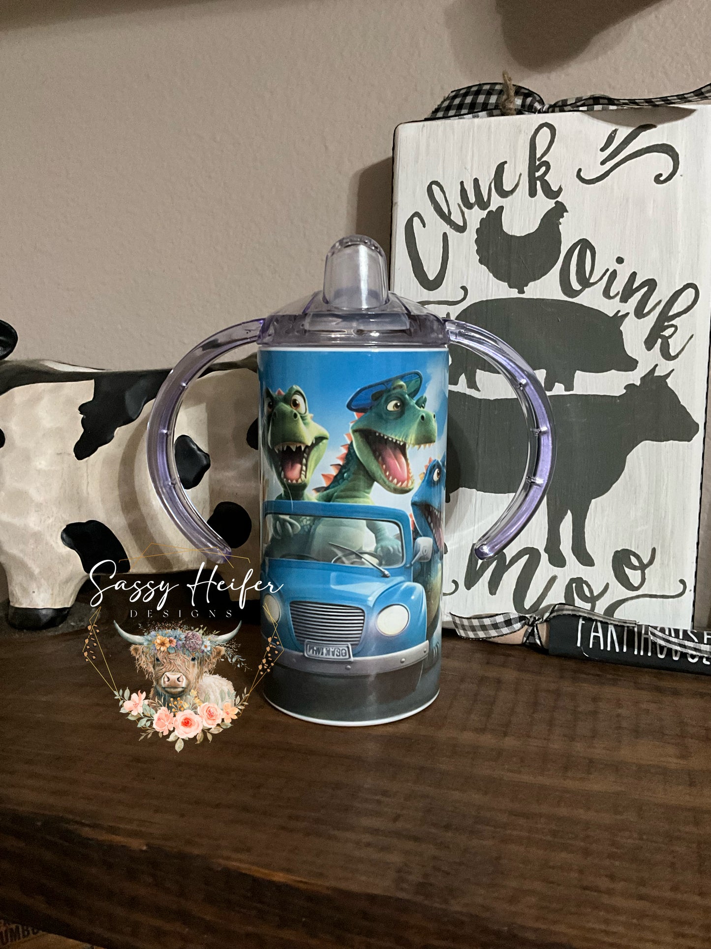 Dinosaurs driving car sippy cup